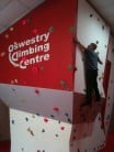 Matthew Pearson climbing the centre pillar at OCC