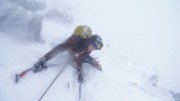 Wintery weather and lens fog on White Magic, Cairngorms. Steve Dunning just exiting the Magic Crack.