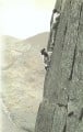 The late George Fisher (of Keswick Climbing Shop fame) belaying Paul Ross on Kern Knotts Crack 1954