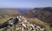 Beda Fell summit cairn, with Ullswater behind.