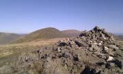 The summit cairn of Yoke, looking north to Ill Bell.