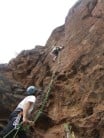 Lew climbing with Keenan belaying