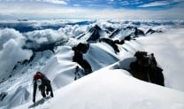 Darrin Fast of the BCMC approaching the summit of Dione via the South West Face (AD). Tantalus Range, British Columbia.
