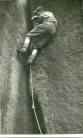This was taken in 1961 and shows Peter Maddocks on Blue Lights Crack on Wimberry Rocks, Chew valley.
