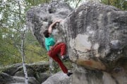 Searching for bigger holds at the top!