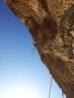 Dominic on the hanging stance above pitch 8 (6c)