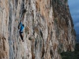 Emma Climbing Never Sleeping Wall in Sicily