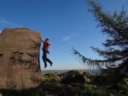 Paul going dyno for the top of Joe's Arete, the Roaches Upper Tier