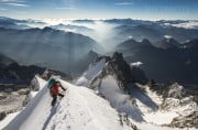 Valentine Fabre high on the Peuterey Arête to Mont Blanc de Cormayeur