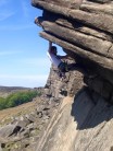 Taking on the crux of Flying Buttress Direct at Stanage Popular