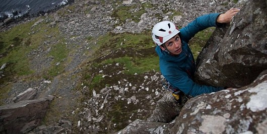 Henry Francis at the top of Jolly Roger (E3 6a), with the 1000 yard stare after 50m of climbing in high wind  © Rob Greenwood - UKC