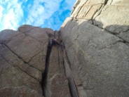 Dope Swag is the climb with two vertical cracks in the corner of St Levans Wall.