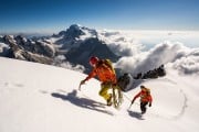 Gabriel Mazur and Laurent Soyris on the Aiguille Verte Summit, Mont Blanc behind