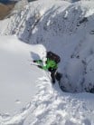 Topping out into sunshine on Hidden Gully
