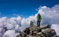 A belay above the clouds