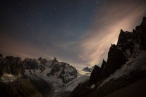 Moonlight and stars over the Dent du Geant, Glacier du Tacul & Dent du Requin with light just visible from the Helbronner.