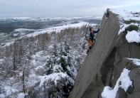 Ropeboy contemplating the leap on a snowy Wings of Unreason (E4 6a), Roaches