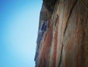AC/DC - Medji - top of 4th pitch belaying under the threatening roof crux pitch