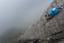 Jade making her way up Botterill's Slab in the cloud.