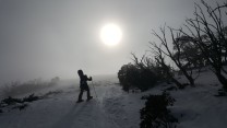 Kai Seth Robertson snowshoeing towards the summit of Mount Stirling (1749m), Victoria, Australia.