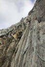 Sion leading accross the first pitch slab.