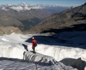 Late season crossing the glacier. Don't look down...