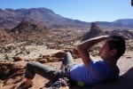Relaxing at the top of The Black Wall in the sun and with wonderful views of the desert granite.