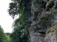 This crag has an intimidating feel about it. Not paticily high but over hanging, or maybe it's where it is. Positioned in  narr