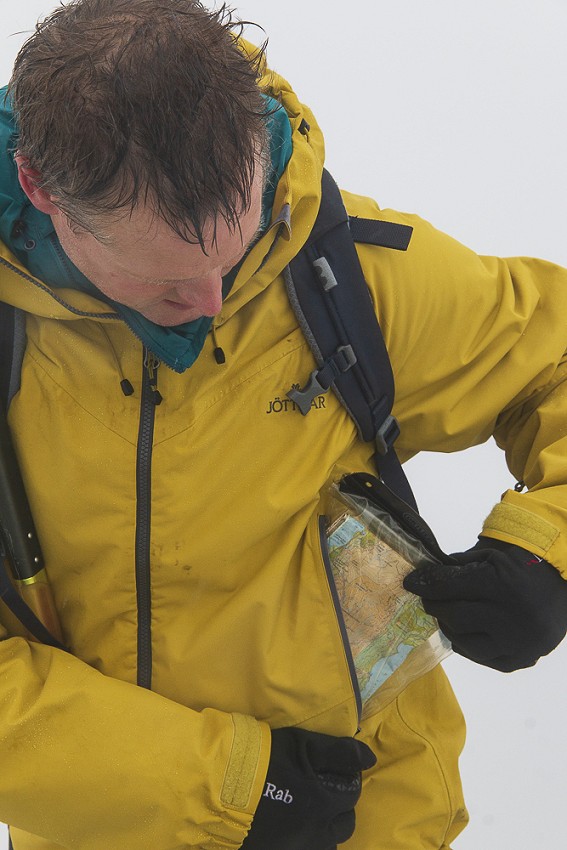 A map is no use in your bag: in bad weather keep it close to hand in a pocket  © Martin McKenna