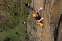 Milo Dixon moving into the twin cracks of Shear Fear at Ratho quarry.