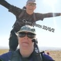 Me and the hubby top of Cairn Gorm. Walked up the Windy Ridge