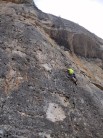 Unknown climber approaching the crux roof on Derecho al Techo