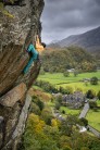 Katie climbs The Bludgeon in typical Autumnal conditions.