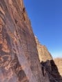 Stretched out on the the big final pitch of ‘Inferno’ on Jebel Rum, Jordan<br>© Ghost