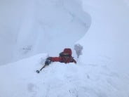 Digging through the cornice on Y gully right hand