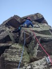 Theo age 12, approaching the tricky crux of route one.
