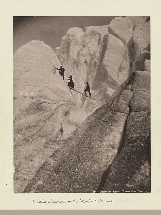 Crossing a crevasse on the Glacier des Bossons.  © Georgio Sommer, 1880/National Library of Scotland.