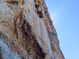 Pulling through the crux section of Red Pillar
