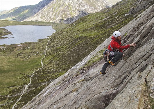 A climber nearing the top Ordinary Route (Diff) on the Iconic Idwal Slabs.  © Mark Reeves