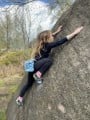 Enjoying her bouldering at Cratcliffe (aged 6)