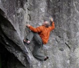 thekettle getting comfortable on 'I can, I can't' V5, Carrock Fell Boulders.