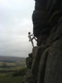 Soloing balcony buttress before the rain