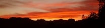 Colourful sunset in Gandia Spain, Purple looking west, deep orange looking east (photo).